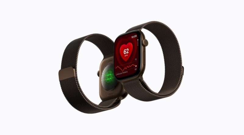 Dvoje Apple Watch Series 12 s milánským tahem a zobrazenou tepovou frekvencí