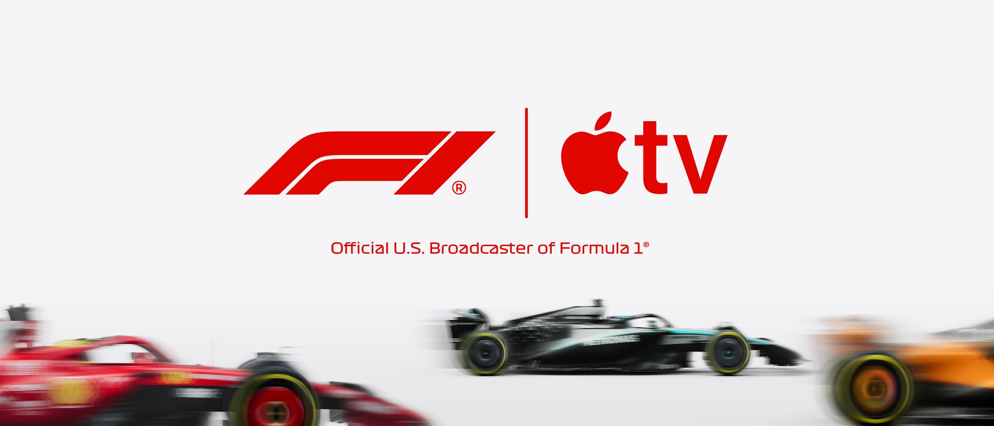 Loga F1 a Apple TV nad formulemi v zatáčce