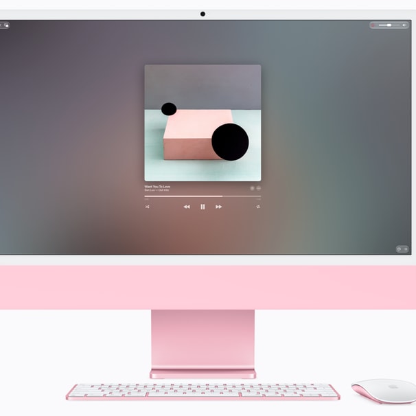 HomePod mini 2 stojící vedle Macu na pracovním stole