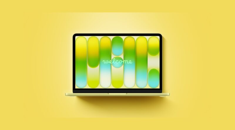 MacBook Neo na žlutém pozadí s otevřeným displejem