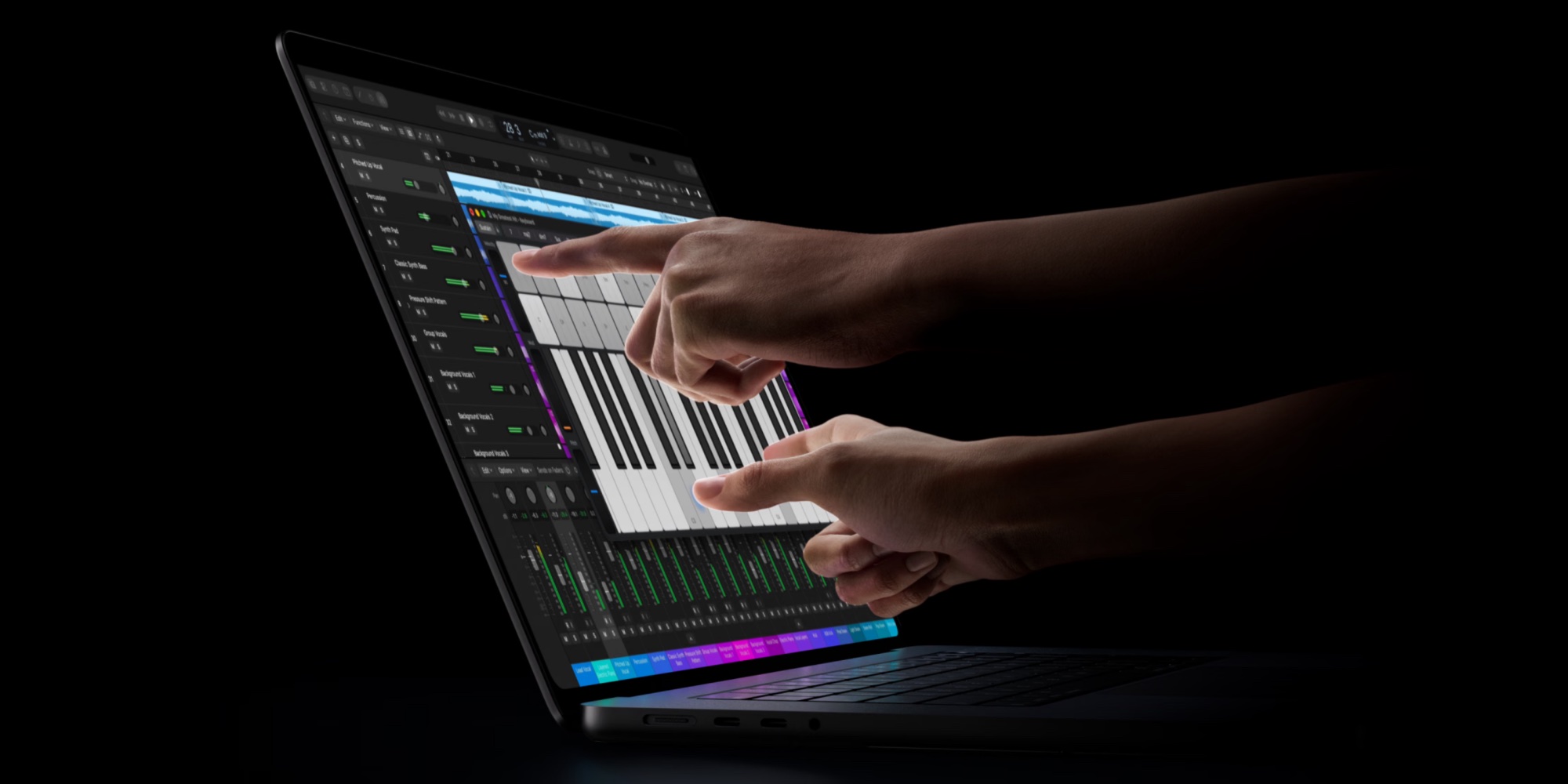 Prsty pracující s posuvníky na dotykovém displeji MacBooku Pro